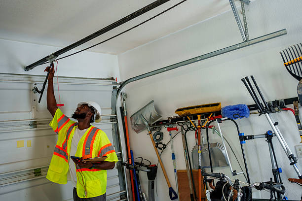 Professional Garage Door Roller Replacement technician working in West, TX